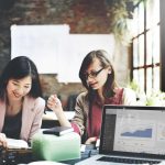 women collaborating in the office