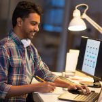 a web designer creating a strategic site in his office