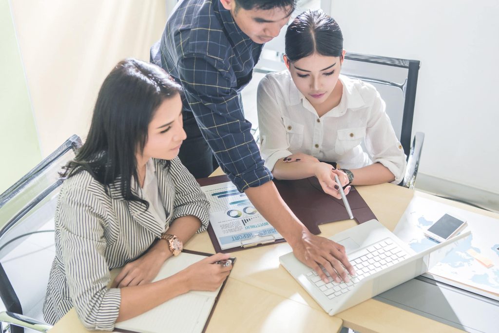 business colleagues going over the strategy for a new client
