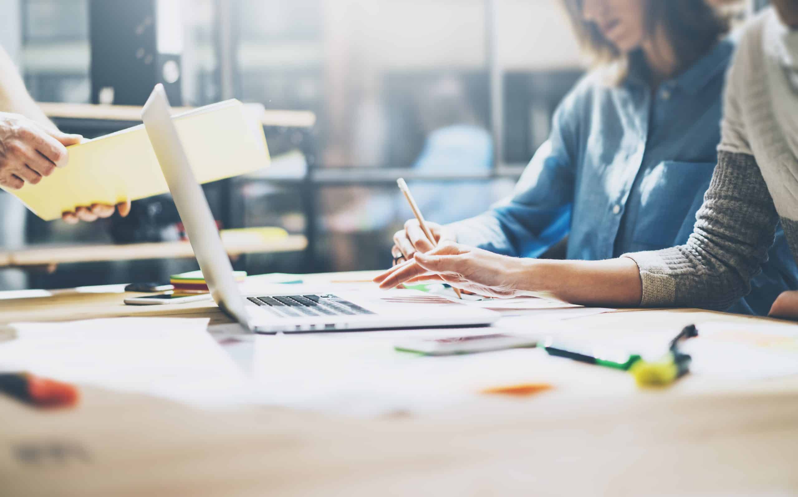 Marketing team working on digital marketing packages.