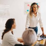 marketing team listening to a marketing messaging framework presentation