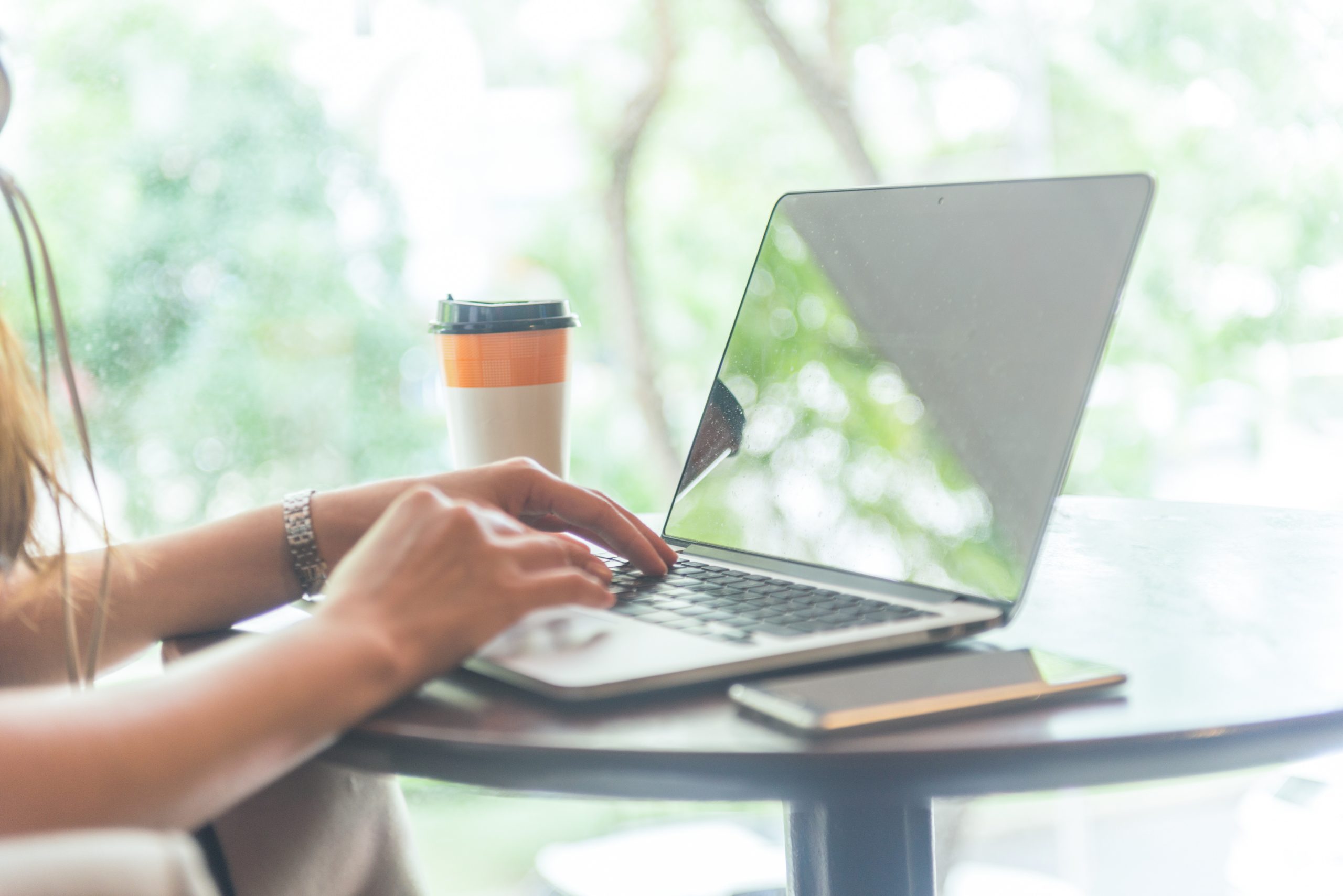 Woman working on how to write website copy